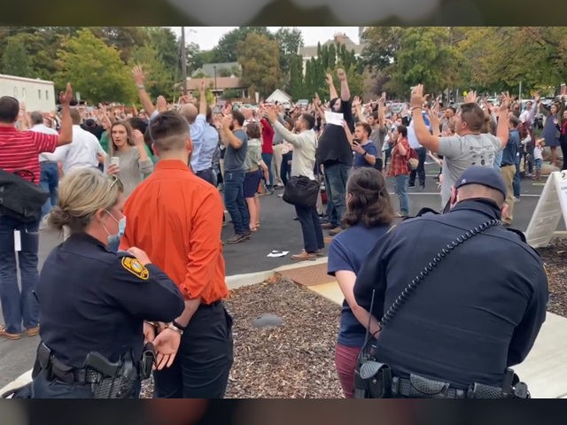 https://media.breitbart.com/media/2020/09/moscow-idaho-psalm-sing-arrest-640x480.jpg