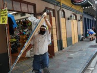 PHOTOS: Downgraded Tropical Storm Sally Lashes Gulf Coast with Wind, Rain