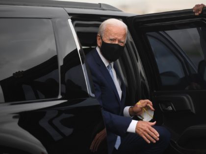 Democratic presidential nominee former US Vice President Joe Biden arrives to board an air