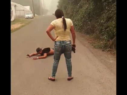 VIDEO: Woman Forces Suspected Arsonist to the Ground at Gunpoint