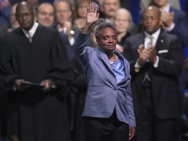 CHICAGO, ILLINOIS - MAY 20: Lori Lightfoot waves to the crowd after being sworn in as Mayor of Chicago during a ceremony at the Wintrust Arena on May 20, 2019 in Chicago, Illinois. Lightfoot become the first black female and openly gay Mayor in the city’s history. (Photo by Scott …