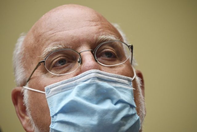 Virus Outbreak Congress Dr. Robert Redfield, director of the Centers for Disease Control and Prevention (CDC), testifies during a House Subcommittee hearing on the Coronavirus crisis, Friday, July 31, 2020 on Capitol Hill in Washington. (Kevin Dietsch/Pool via AP)