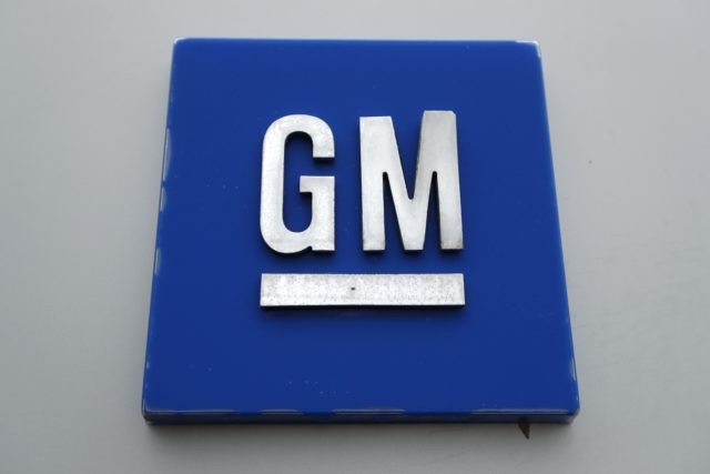 This Jan. 27, 2020, file photo shows a General Motors logo at the General Motors Detroit-Hamtramck Assembly plant in Hamtramck, Mich. Shares in electric- and hydrogen-powered truck startup Nikola plunged on Monday Sept. 21, 2020, after the company's founder Trevor Milton resigned amid allegations of fraud - just two weeks …