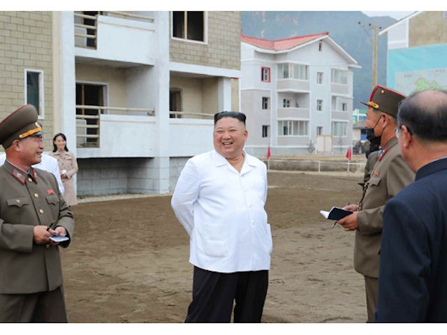 North Korea: dictator Kim Jong-un (and sister Kim Yo-jong, in the background) visit flooded locations (Rodong Sinmun)