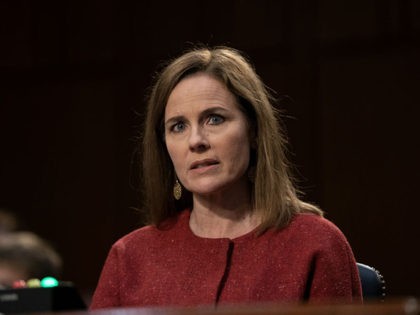 WASHINGTON, DC - OCTOBER 13: Supreme Court nominee Judge Amy Coney Barrett testifies before the Senate Judiciary Committee on the second day of her Supreme Court confirmation hearing on Capitol Hill on October 13, 2020 in Washington, DC. With less than a month until the presidential election, President Donald Trump …