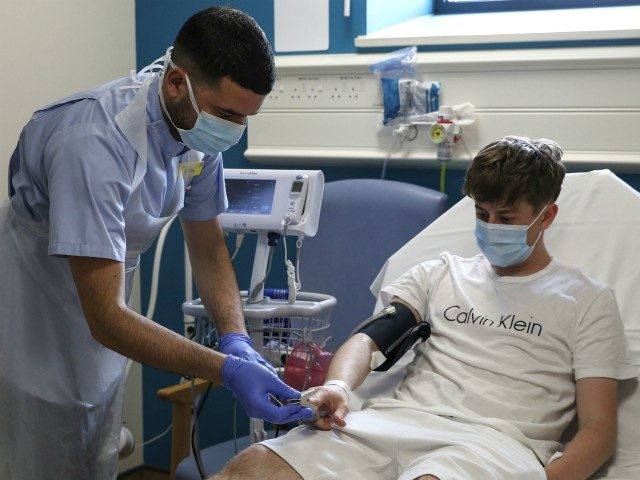 WEXHAM, ENGLAND - MAY 22: Image released on May 27, Patient Chay Godfrey is treated by staff nurse Elia Sarno in the Emergency Department at Wexham Park Hospital near Slough on May 22, 2020 in Wexham, United Kingdom. A&E services at the hospital have remained open throughout the pandemic with …