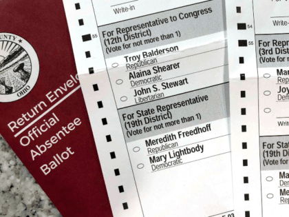 This photo made on Oct. 6, 2020, in Westerville, Ohio, shows Ohio absentee ballots. Two voters registered at the same address in the Columbus suburb of Westerville, Ohio, were mailed these differing absentee ballots for the 2020 general election, with one of the ballots listing candidates from a different congressional …