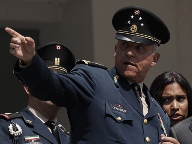 Mexico's Defense Secretary Gen. Salvador Cienfuegos Zepeda gestures as U.S. Defense Secretary Jim Mattis listens during a reception ceremony in Mexico City, Friday, Sept. 15, 2017. Mattis is meeting with senior Mexican government officials in the capital on the eve of Mexico's national Independence Day. At right is Secretary of …