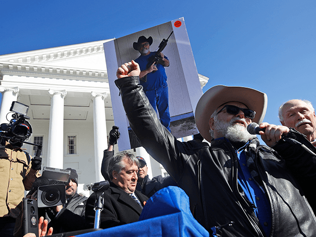 Stephen Willeford, who disrupted the mass murder in his small town's First Baptist Church in Texas, speaks to the crowd of pro gun demonstrators at the Virginia State Capitol Monday, Jan. 20, 2020, in Richmond, Va. (AP Photo/Steve Helber)