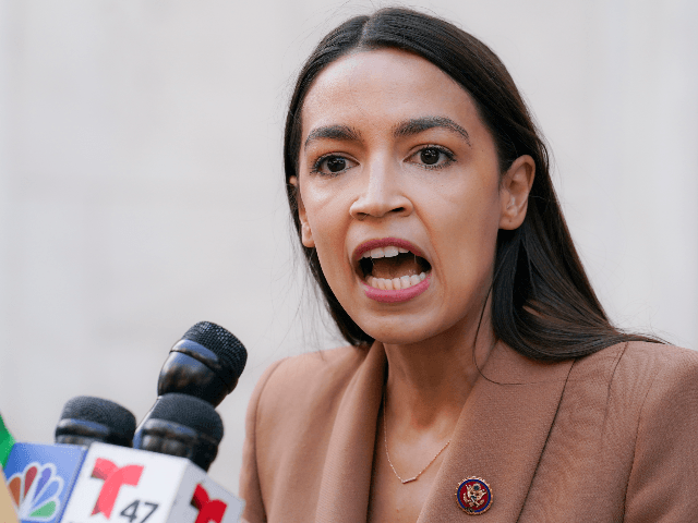 Rep. Alexandria Ocasio-Cortez, D-NY, speaks during a news conference outside the United States Postal Service Jamaica station, Tuesday, Aug. 18, 2020, in the Queens borough of New York. The Postal Service said it has stopped removing mailboxes and mail-sorting machines amid an outcry from lawmakers, as President Donald Trump denied …