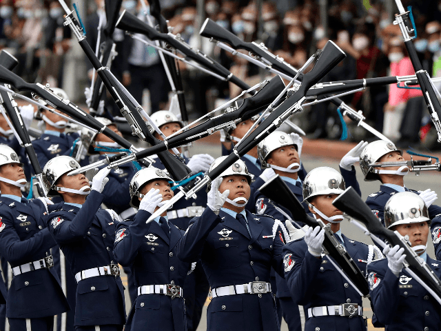 The military honor guard performs during the National Day celebrations in Taipei, Taiwan,