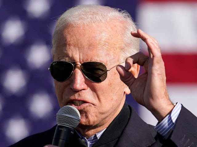 Democratic presidential candidate former Vice President Joe Biden speaks at a rally, also attended by former President Barack Obama, at Northwestern High School in Flint, Mich., Saturday, Oct. 31, 2020. (AP Photo/Andrew Harnik)