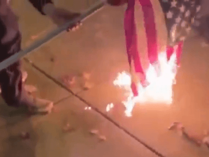 Antifa burns an American flag after stealing it from a pickup truck in Vancouver, Washingt