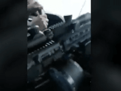 A video shows heavily armed human smugglers operating about 80 miles into the United States in South Texas. (Cartel Video Screen capture)