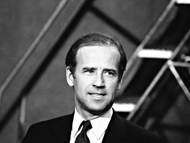 Sen. Joseph Biden (D-Del.), smiles while talking with reporters shortly before his appearance on NBC's "Meet the Press" program in Washington, D.C., Sunday, April 29, 1984. The program was broadcast live at 12:30 p.m. EDT. (AP Photo/Charles Tasnadi)