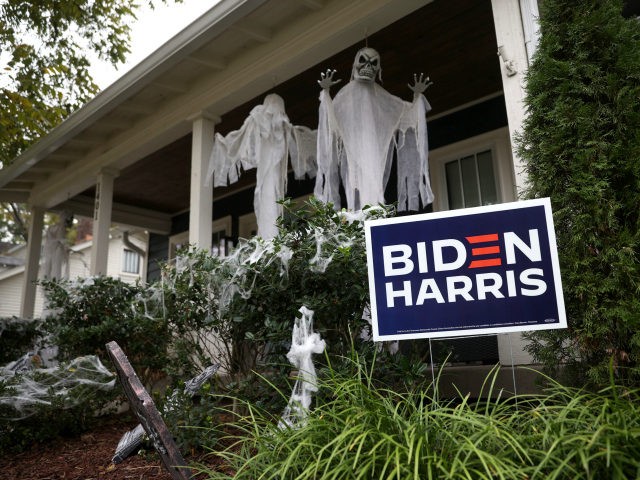 Campaign signs for democratic presidential nominee Joe Biden are posted in front of a home