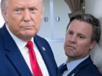 Campaign manager Bill Stepien stands alongside US President Donald Trump as he speaks with reporters aboard Air Force One as he flies from Manchester, New Hampshire to Joint Base Andrews in Maryland, August 28, 2020, following a campaign rally. (Photo by SAUL LOEB / AFP) (Photo by SAUL LOEB/AFP via …