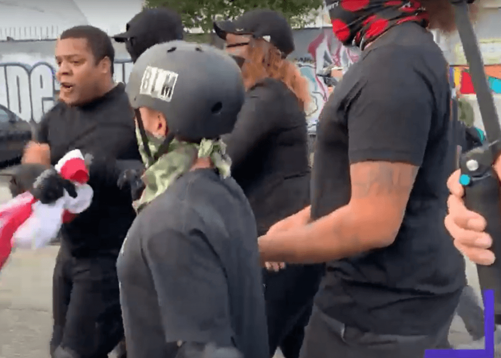 Black Veteran assaulted by BLM protesters. (YouTube Video Screenshot/Hesitant Heroes)