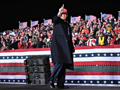 US President Donald Trump gestures during a rally at Southern Wisconsin Regional Airport in Janesville, Wisconsin on October 17, 2020. (Photo by MANDEL NGAN / AFP) (Photo by MANDEL NGAN/AFP via Getty Images)