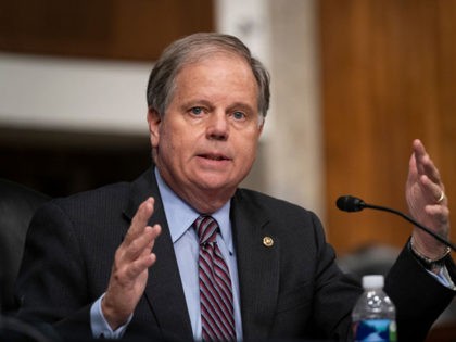 WASHINGTON, DC - SEPTEMBER 23: U.S. Sen. Doug Jones (D-AL) asks a question at a hearing of the Senate Health, Education, Labor and Pensions Committee on September 23, 2020 in Washington, DC. The committee is examining the federal response to the coronavirus pandemic. (Photo by Alex Edelman-Pool/Getty Images)