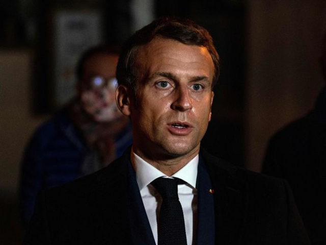 French President Emmanuel Macron speaks on October 16, 2020, in front of a middle school in Conflans Saint-Honorine, 30kms northwest of Paris, after a teacher was decapitated by an attacker who has been shot dead by policemen. - French anti-terror prosecutors said on October 16 they were investigating an assault …