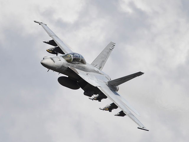 TOWNSVILLE, AUSTRALIA - OCTOBER 14: A RAAF (Royal Australian Air Force) F/A-18F Super Hornet conducts a 'show of force' as part of Exercise Nigrum Pugio on October 14, 2020 in Townsville, Australia. Exercise Nigrum Pugio 20-2 is a biannual, joint live fire exercise which enables the Australian Army’s Joint Terminal …