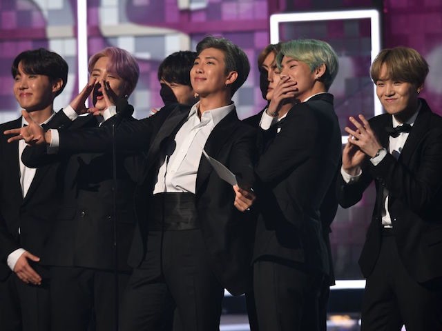 South Korean band BTS presents the award for Best R&B Album during the 61st Annual Grammy Awards on February 10, 2019, in Los Angeles. (Photo by Robyn Beck / AFP) (Photo credit should read ROBYN BECK/AFP via Getty Images)