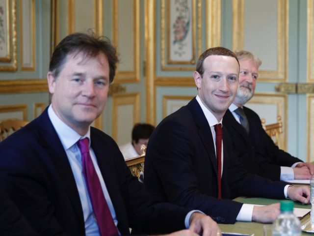 CEO and co-founder of Facebook Mark Zuckerberg poses next to Facebook head of global policy communications and former UK deputy prime minister Nick Clegg (L) prior to a meeting with French President at the Elysee Palace in Paris, on May 10, 2019. (Photo by Yoan VALAT / EPA POOL / …