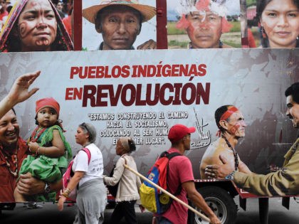 View of a sign during a march in solidarity with Ecuadorean indigenous in Caracas, Venezuela on October 15, 2019, following the agreement between indigenous leaders and Ecuador's President Lenin Moreno. (Photo by Yuri CORTEZ / AFP) (Photo by YURI CORTEZ/AFP via Getty Images)