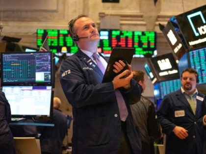 NEW YORK, NY - MARCH 04: Traders working the floor of the New York Stock Exchange (NYSE) on March 4, 2020 in New York City. Stocks soared as results of Joe Biden leads at Super Tuesday primary results Rebounds, stock closing at over 1,100 Points. (Photo by David Dee Delgado/Getty …
