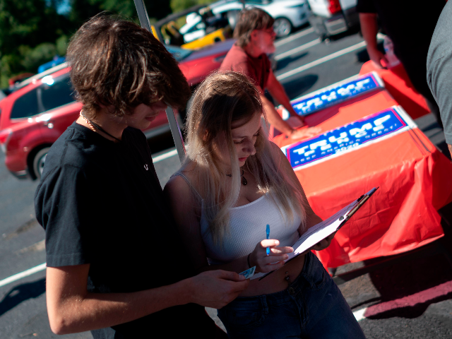 Catherine McDermott (R) registars to vote for the first time during a Republican voter registration in Brownsville, Pennsylvania on September 5, 2020. - Less than two months before the November 3 presidential election, the contrast between Republicans and Democrats is striking in Washington County, in the suburbs of Pittsburgh. (Photo …