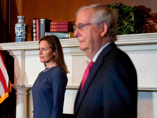 Supreme Court nominee Judge Amy Coney Barrett meets with Senate Majority Leader Mitch McConnell of Kentucky, on Capitol Hill in Washington,DC on September 29, 2020. (Photo by Susan Walsh / POOL / AFP) (Photo by SUSAN WALSH/POOL/AFP via Getty Images)