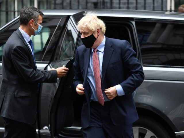 LONDON, ENGLAND - OCTOBER 06: British Prime Minister Boris Johnson arrives at Downing Street after delivering his Leader's Speech to the Conservative Party Conference on October 6, 2020 in London, England. Due to Covid-19 restrictions the political party conferences are being held virtually this year. In his leader's speech Johnson …
