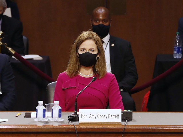 Amy Coney Barrett arrives for a confirmation hearing before the Senate Judiciary Committee, to become an Associate Justice of the US Supreme Court on Capitol, on Hill in Washington, DC on October 12, 2020. (Photo by SHAWN THEW / POOL / AFP) (Photo by SHAWN THEW/POOL/AFP via Getty Images)
