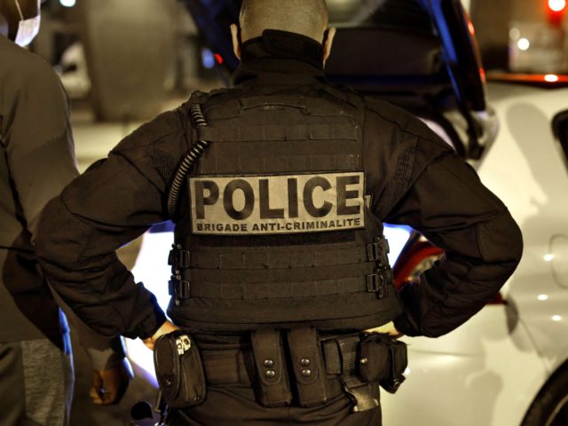 A French police officer of the anti-crime squad, Brigade Anti-Criminalite de nuit (BAC N 75) is seen during a control in Paris, on October 16, 2020. (Photo by THOMAS COEX / AFP) (Photo by THOMAS COEX/AFP via Getty Images)