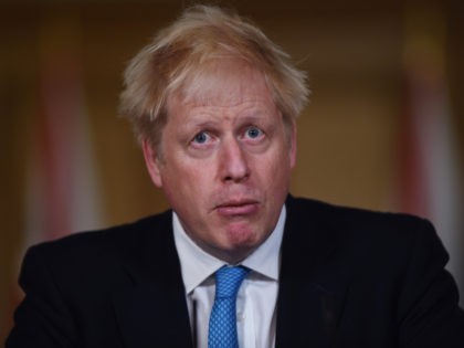 LONDON, ENGLAND - OCTOBER 16: Britain's Prime Minister Boris Johnson speaks during a virtual press conference on the latest coronavirus data at Downing Street on October 16, 2020 in London, England. The government announced further regions going into Tier 3 Coronavirus restriction as of midnight on Friday. Government data released …