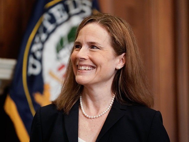 WASHINGTON, DC - OCTOBER 21: Supreme Court nominee Judge Amy Coney Barrett listens during