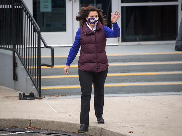 DETROIT, MI - OCTOBER 25: Michigan Governor Gretchen Whitmer waves before Democratic U.S. Vice Presidential nominee Sen. Kamala Harris (D-CA) appears at IBEW Local Union 58 on October 25, 2020 in Detroit, Michigan. Harris is traveling to multiple locations in the metro Detroit area to campaign for Democratic presidential nominee …