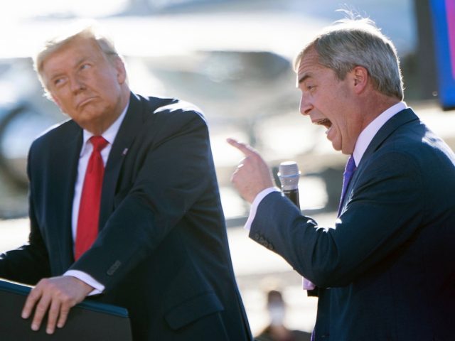 US President Donald Trump listens as Nigel Farage (R) speaks during a Make America Great A