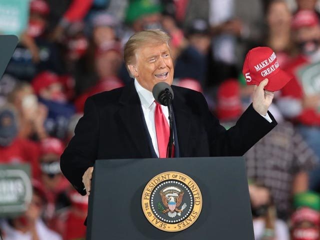 DES MOINES, IOWA - OCTOBER 14: President Donald Trump speaks to supporters during a rally at the Des Moines International Airport on October 14, 2020 in Des Moines, Iowa. According to a recent poll, Trump leads former Vice President Joe Biden by 6 points in the state. (Photo by Scott …