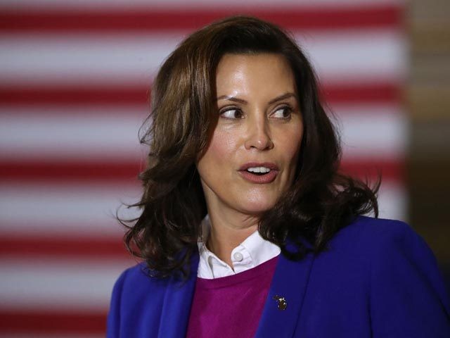 SOUTHFIELD, MICHIGAN - OCTOBER 16: Gov. Gretchen Whitmer introduces Democratic presidential nominee Joe Biden delivers remarks about health care at Beech Woods Recreation Center October 16, 2020 in Southfield,m Michigan. With 18 days until the election, Biden is campaigning in Michigan, a state President Donald Trump won in 2016 by …