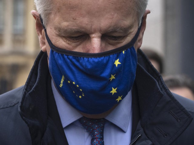 LONDON, ENGLAND - OCTOBER 23: EU Brexit negotiator Michel Barnier walks with members of t