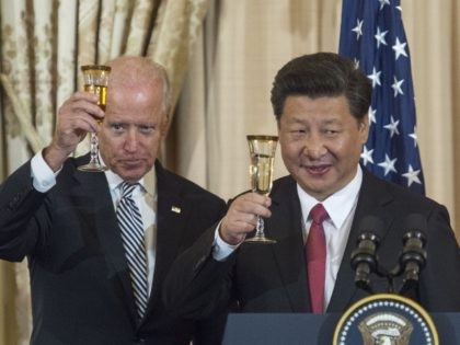 (L-R) US Vice President Joe Biden, Chinese President Xi Jinping and US Secretary of State