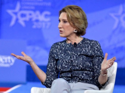 Former Republican presidential candidate Carly Fiorina (R) speaks as Arthur Brooks of the American Enterprise Institute listens during a discussion at the Conservative Political Action Conference (CPAC) at National Harbor, Maryland, February 24, 2017. / AFP / Mike Theiler (Photo credit should read MIKE THEILER/AFP via Getty Images)
