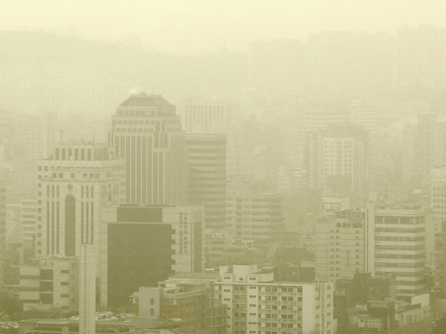 SEOUL, REPUBLIC OF KOREA: Skyscrapers in downtown Seoul on 13 March 2006 are shrouded by y