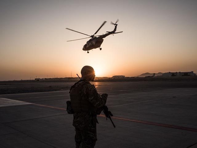 KANDAHAR, AFGHANISTAN - SEPTEMBER 9: A member of the United States Air Force keeps watch o