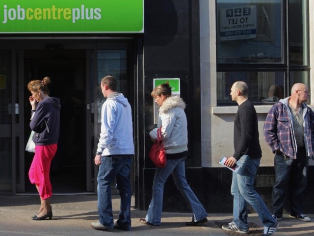 BRISTOL, UNITED KINGDOM - MARCH 18: People queue outside a Job Centre on March 18, 2009 in