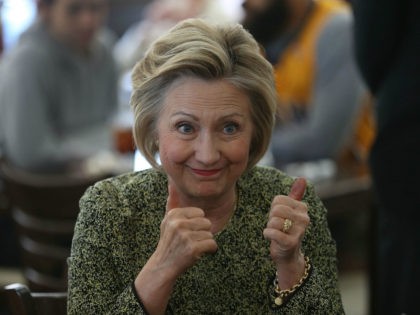 Democratic presidential candidate Hillary Clinton gives a thumbs up during a stop at the Lincoln Square pancake house as she campaign for votes on May 1, 2016 in Indianapolis, Indiana. Presidential candidates continue to campaign across the state leading up to Indiana's primary day on Tuesday. (Photo by Joe Raedle/Getty …
