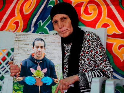 The mother of Iyad Hallak, a 32-year-old Palestinian man with autism who was shot dead by Israeli police when they mistakenly thought he was armed with a pistol, mourns her son at their home in annexed east Jerusalem on June 1, 2020 - Last week a police officer who believed …