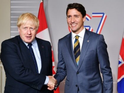 BIARRITZ, FRANCE - AUGUST 24: British Prime Minister Boris Johnson (L) shakes hands with Prime Minister of Canada Justin Trudeau ahead of a bilateral meeting on August 24, 2019 in Biarritz, France. The French southwestern seaside resort of Biarritz is hosting the 45th G7 summit from August 24 to 26. …